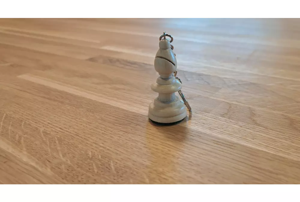 Brelok biały goniec